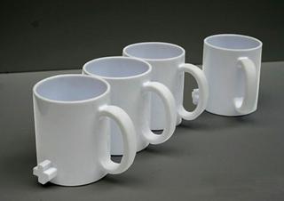 Illustration for article titled Link Mugs Let You Carry Six Cups at a Time